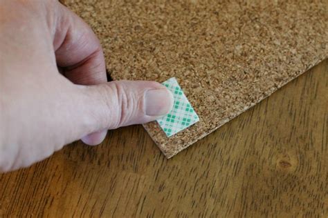 instructions for hanging a corkboard